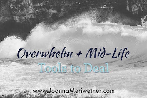 a large wave crashing on some rocks with the words 'mid-life and overwhelm' across the top